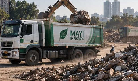 A Mayi Explorers tipper truck being loaded with sorted waste for transport off site.