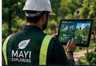 A field worker holding a tablet