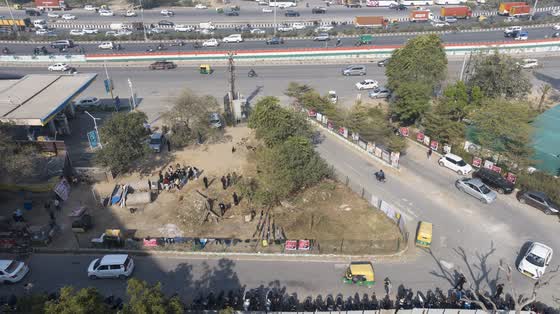 The site from the air, beside the main road.