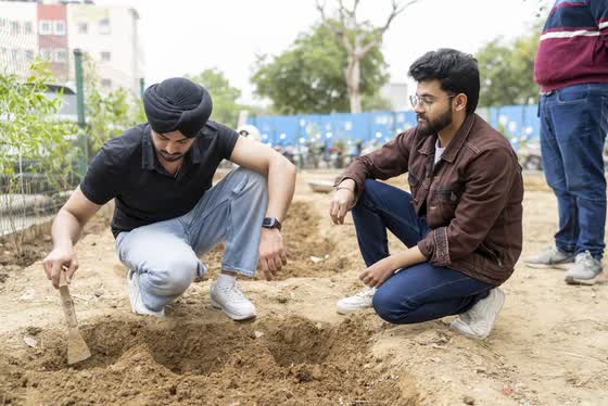 Digging the first pits by hand.